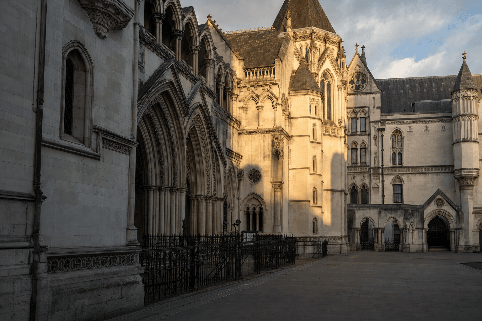 Exterior of a traditional English courthouse building in warm daylight
